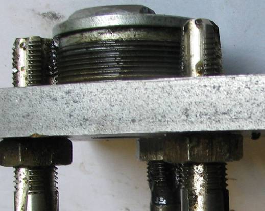 Taps locknutted to back off cutting edges for tightness on LH bearing cup.jpg